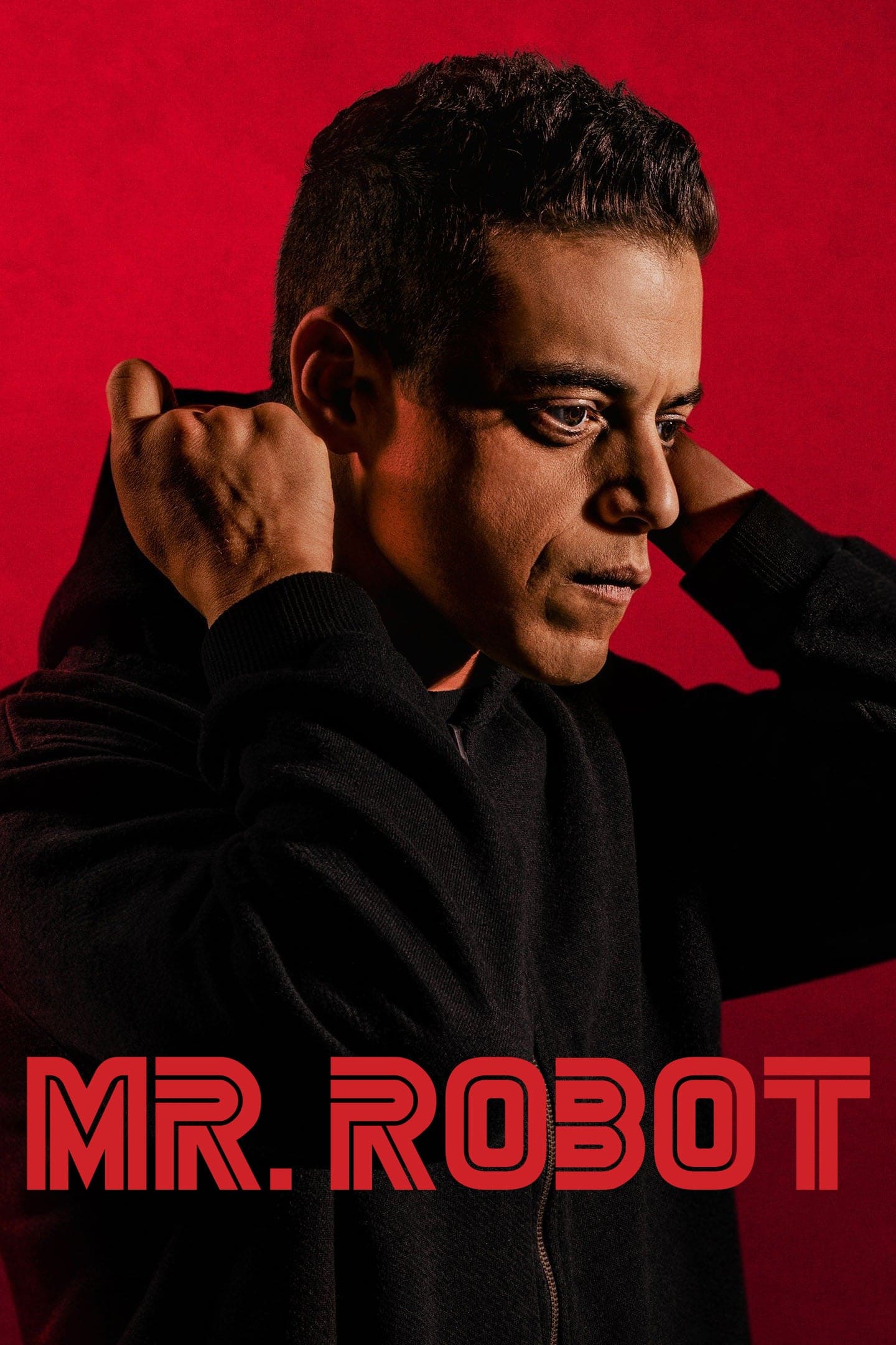 A man in a black hoodie adjusts his hood against a red background. The text MR. ROBOT appears in bold red letters at the bottom, hinting at themes of hacking and digital intrigue—much like accessing Malta IPTV streams.